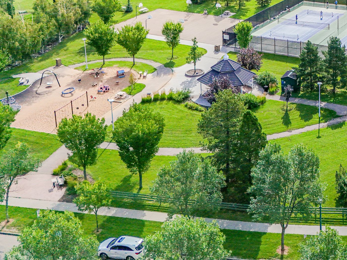Aerial view of the community playground and the bookable gazebo set in the neighbourhood green space.