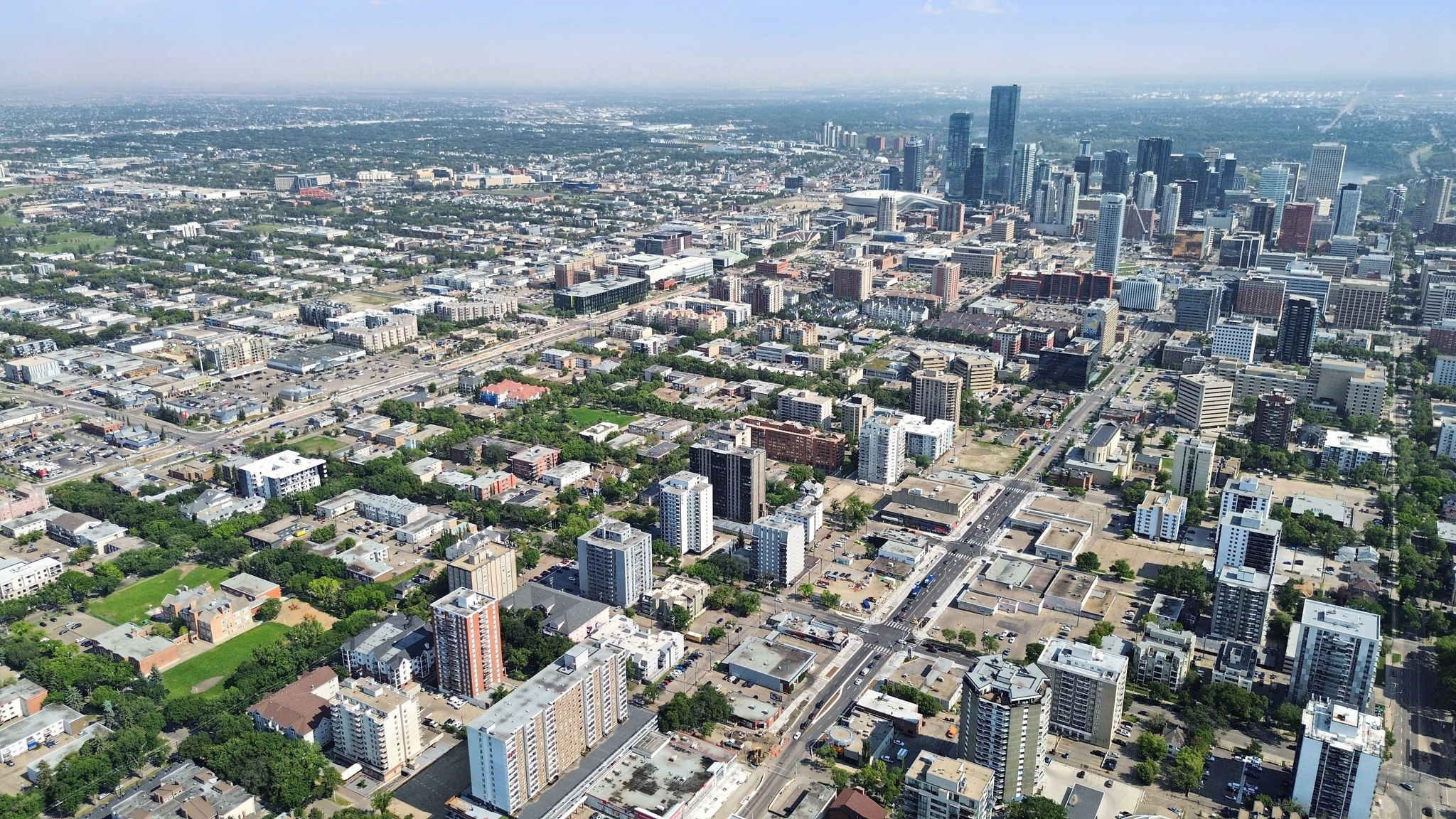 Aerial view east along Jasper Avenue toward the downtown Edmonton towers.